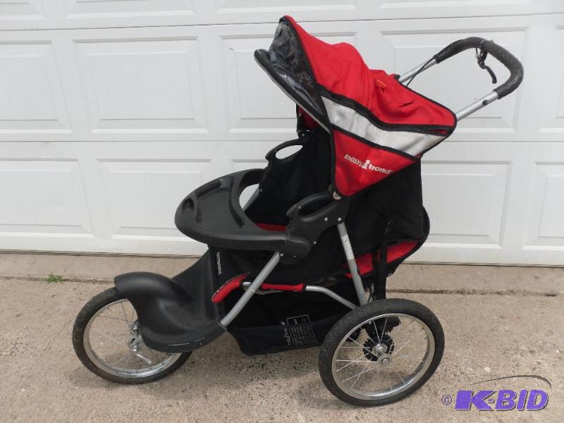 lot 223 image: Baby Trend Expedition Jogging Stroller. Is to...