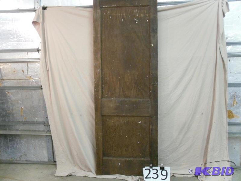 lot 239 image: Old Wood Door. Measures 38" x 79"....