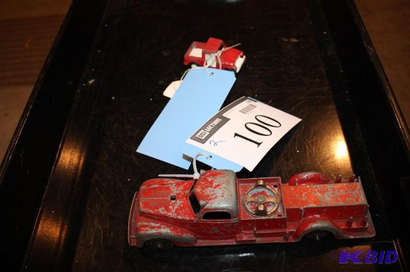lot 100 image: Lot of (2) items including a red toy car and ...
