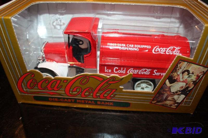 lot 108 image: CocaCola die-cast metal bank...