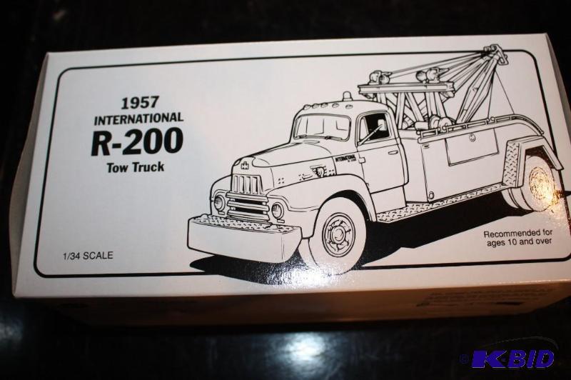 lot 111 image: 1957 International R-200 tow truck...