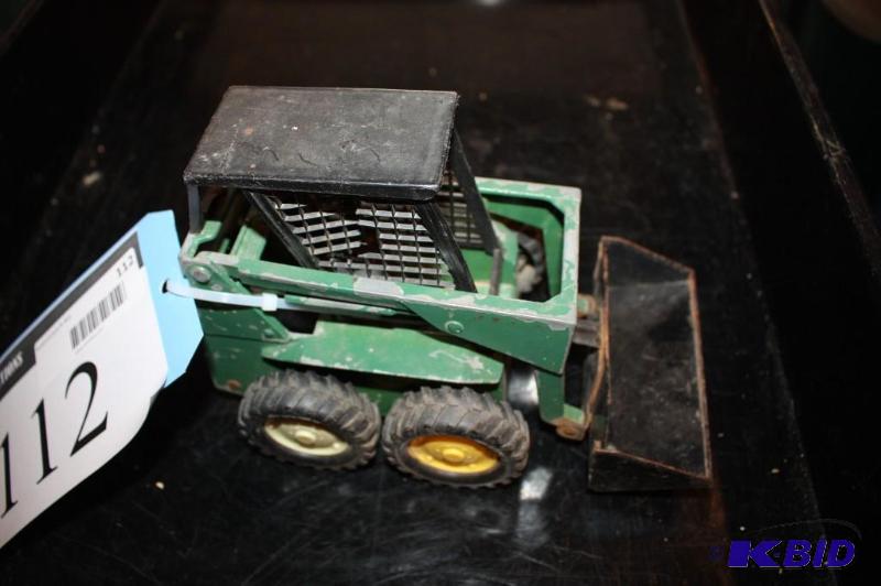 lot 112 image: A metal green tractor...