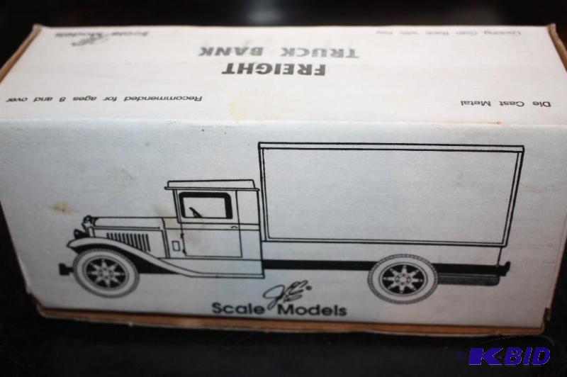 lot 118 image: Freight truck locking coin bank with key...