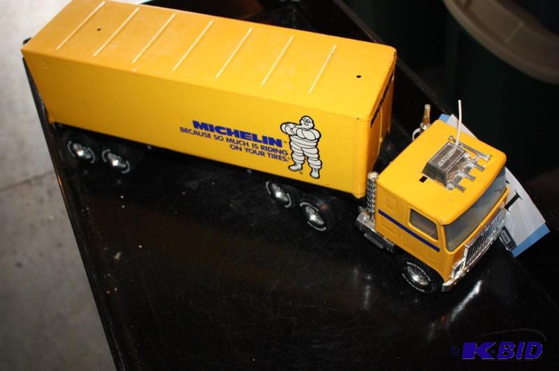 lot 126 image: GMC semi truck with Michelin trailer...