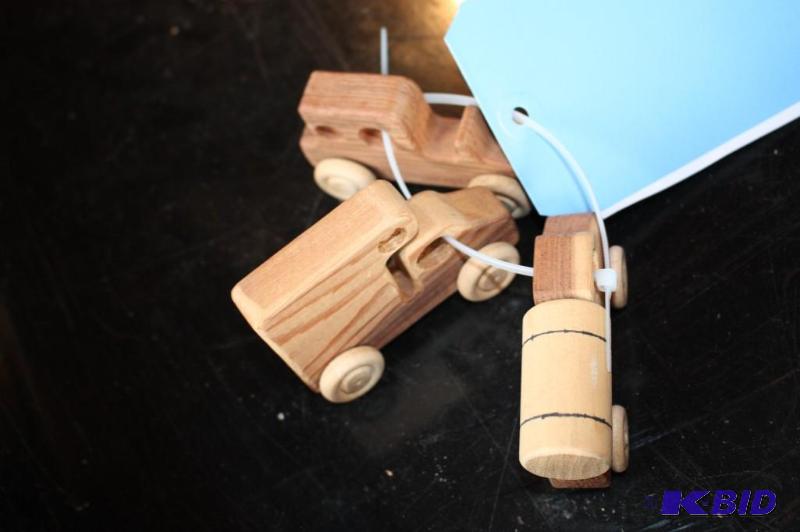 lot 14 image: A lot of (3) items including a toy wooden car...