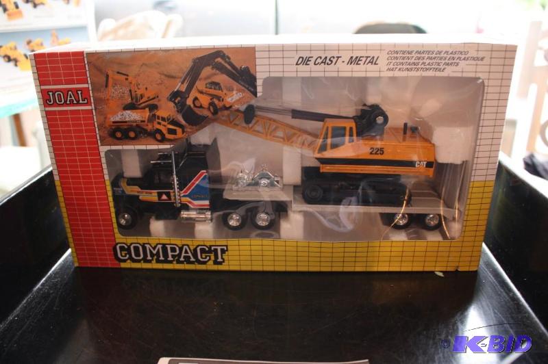 lot 151 image: Compact semi truck and Caterpillar 225 tracto...
