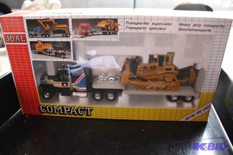 lot 153 image: Compact semi truck and Caterpillar D10N ...