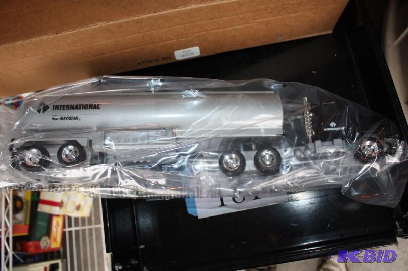 lot 181 image: International semi truck and tanker trailer...