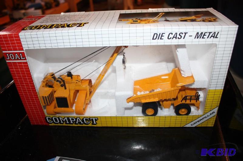 lot 191 image: Compact Caterpillar dump truck and crane...