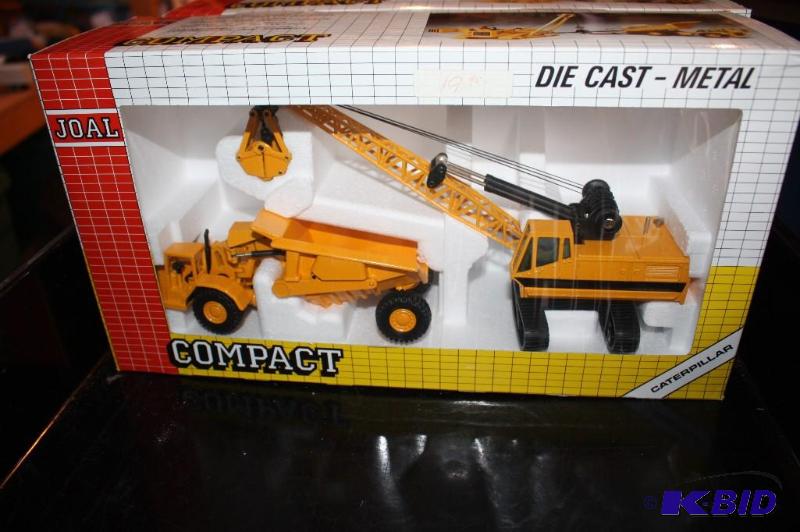lot 192 image: Compact Caterpillar excavator and tractor...