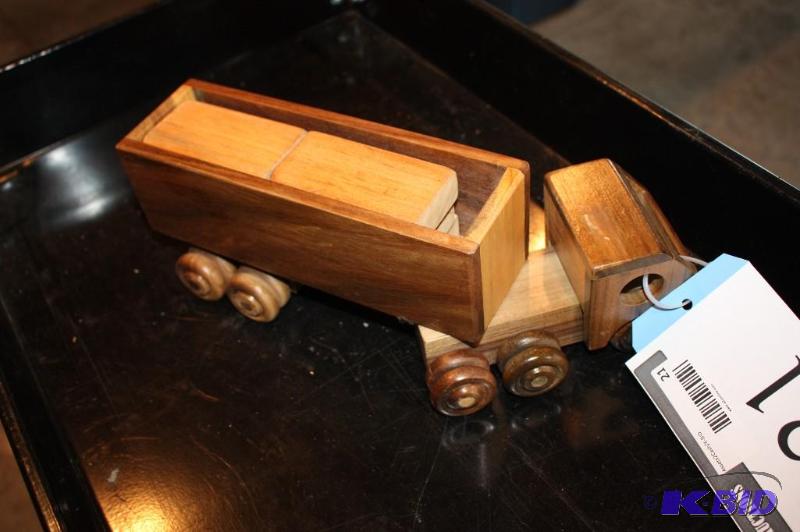 lot 21 image: A wooden semi truck toy...