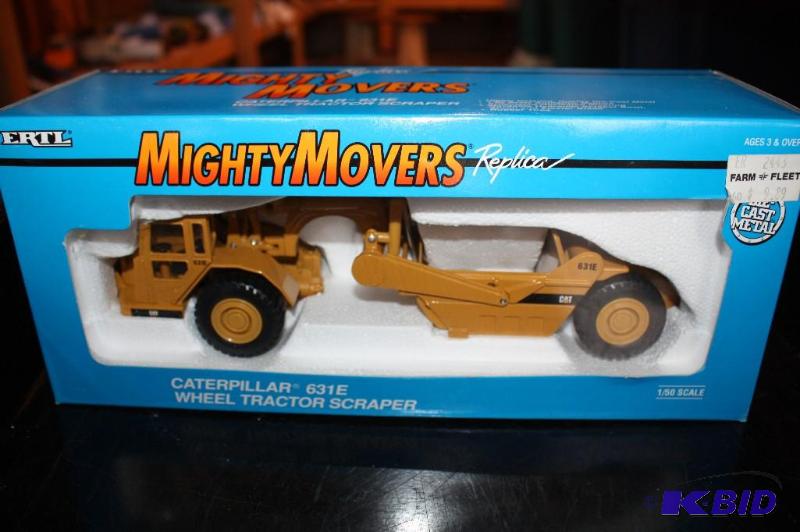 lot 211 image: Mighty Movers Caterpillar 631E wheel tractor ...