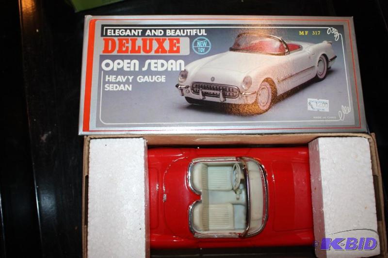 lot 214 image: Deluxe open sedan heavy&nbspgauge sedan...