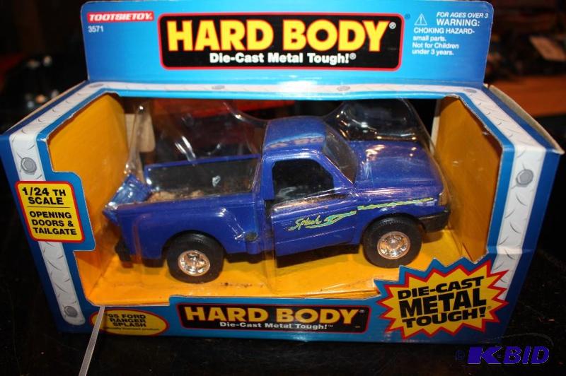 lot 276 image: Hard Body 95 Ford die-cast metal ranger spla...