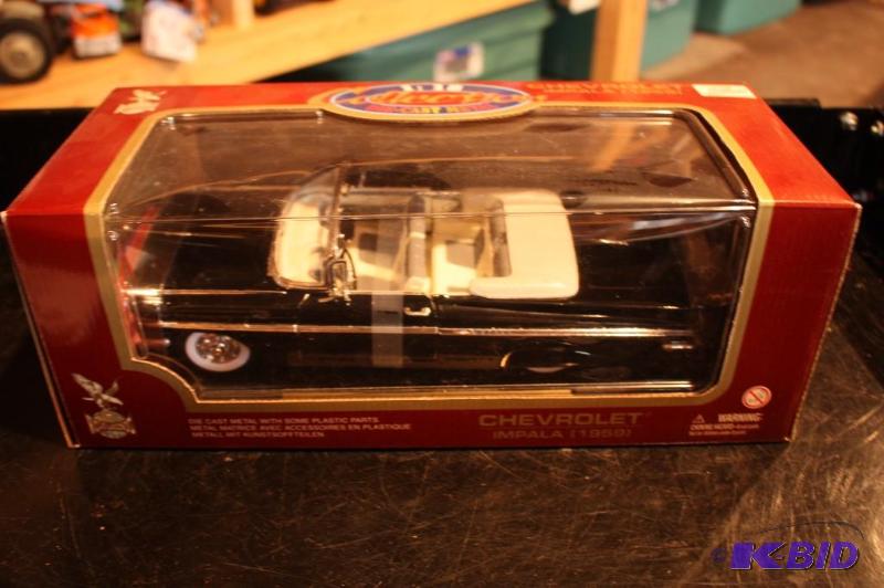 lot 302 image: 1959 Chevrolet die-cast metal impala with mov...