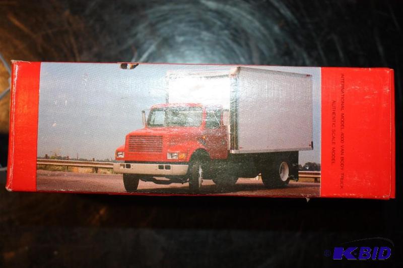 lot 309 image: International model 4000 van body truck...