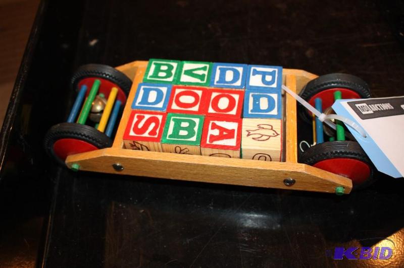 lot 31 image: A rolling wooden childs toy...