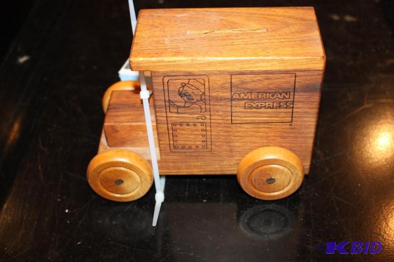 lot 35 image: A wooden American Express toy truck...