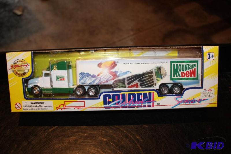 lot 357 image: Mountain Dew semi truck and trailer...