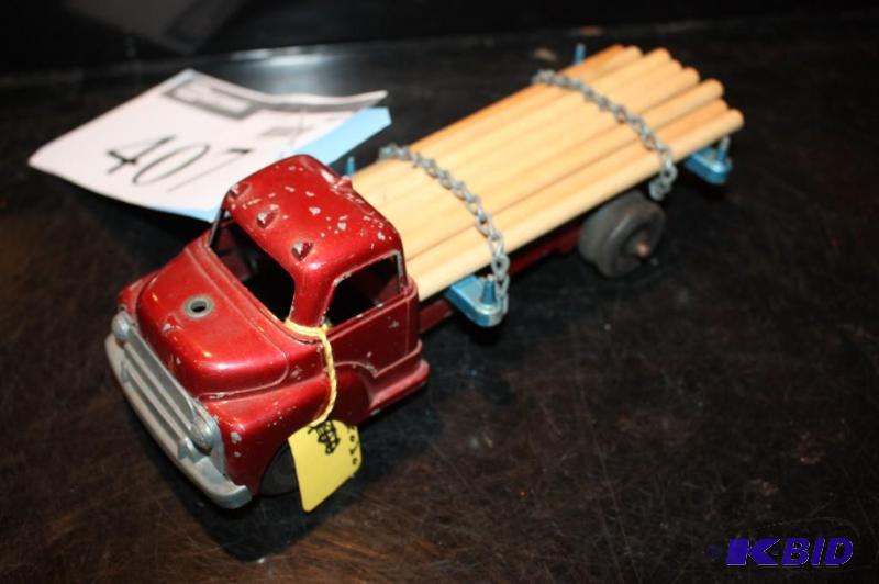 lot 407 image: Vintage metal toy lumber truck...