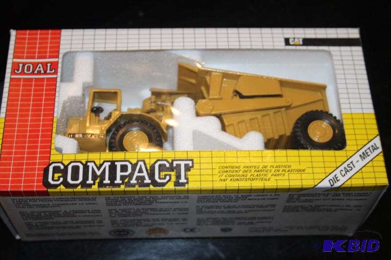 lot 454 image: Compact Caterpillar 631 with tipper tractor d...