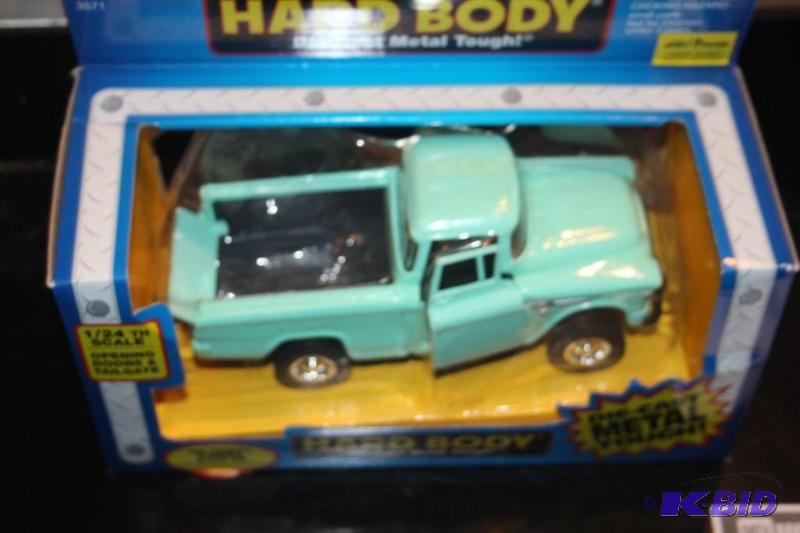 lot 455 image: Hard Body 55 Chevy cameo 3100 V8 die-cast me...