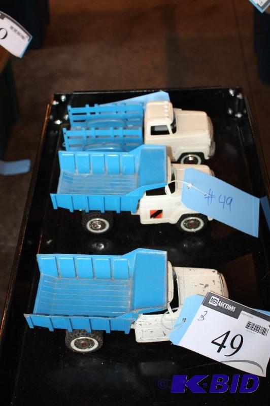 lot 49 image: Lot of (3) items including (2) toy dump truck...