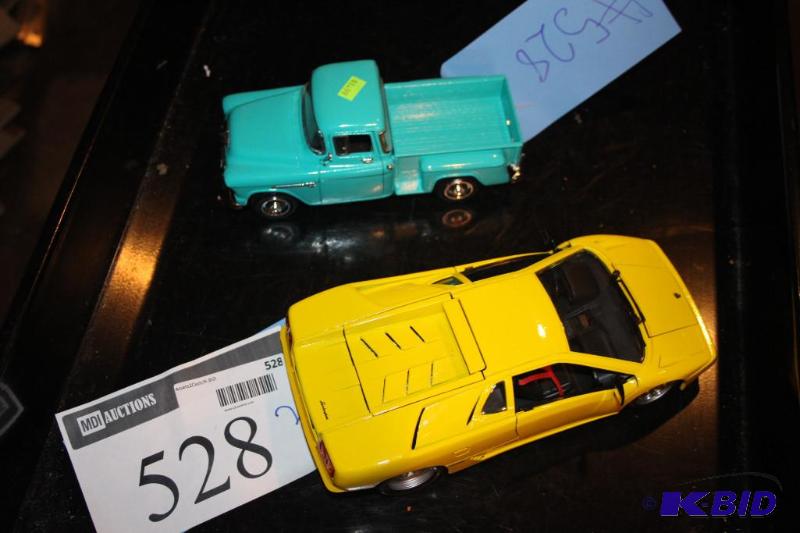 lot 528 image: Lot of (2) items including a Lamborghini toy ...