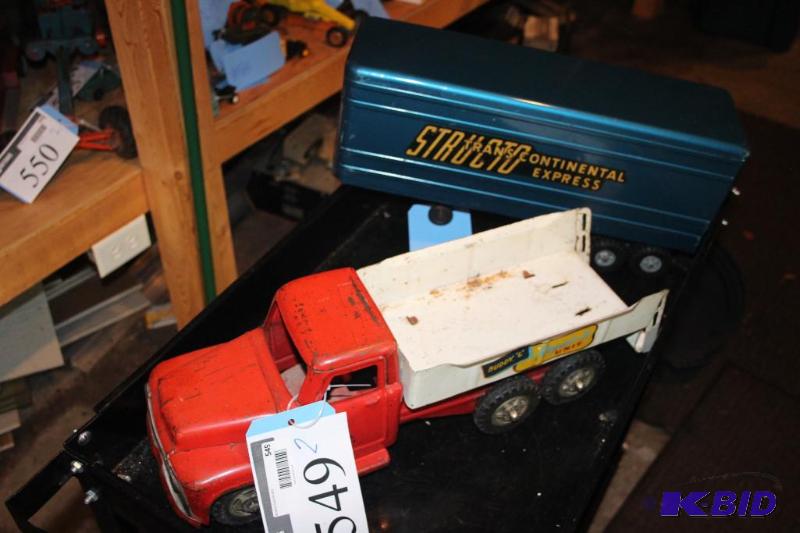 lot 549 image: Lot of (2) items including a Structo tans con...