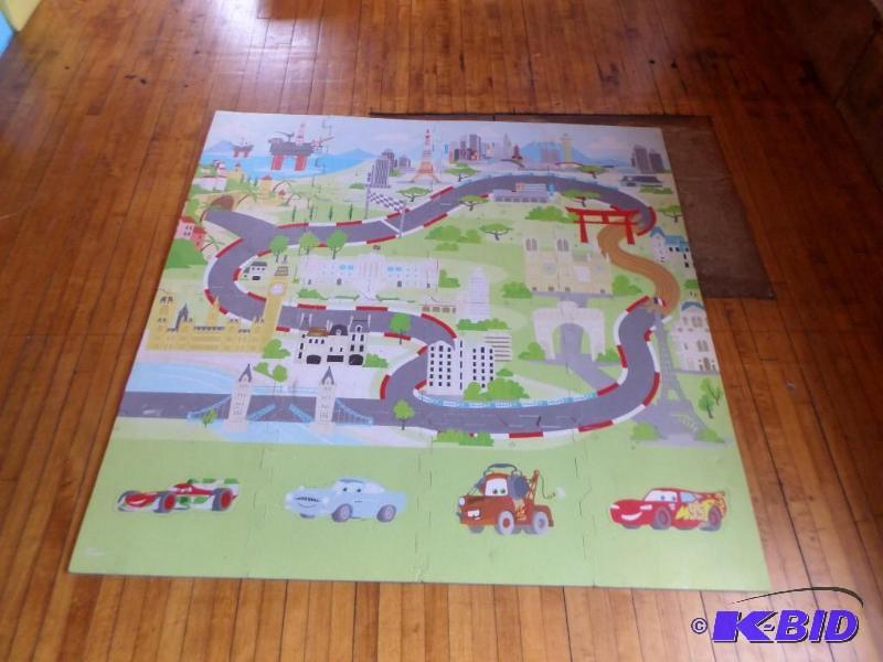 lot 29 image: Cars 3 x 5 foam puzzle floor mat...
