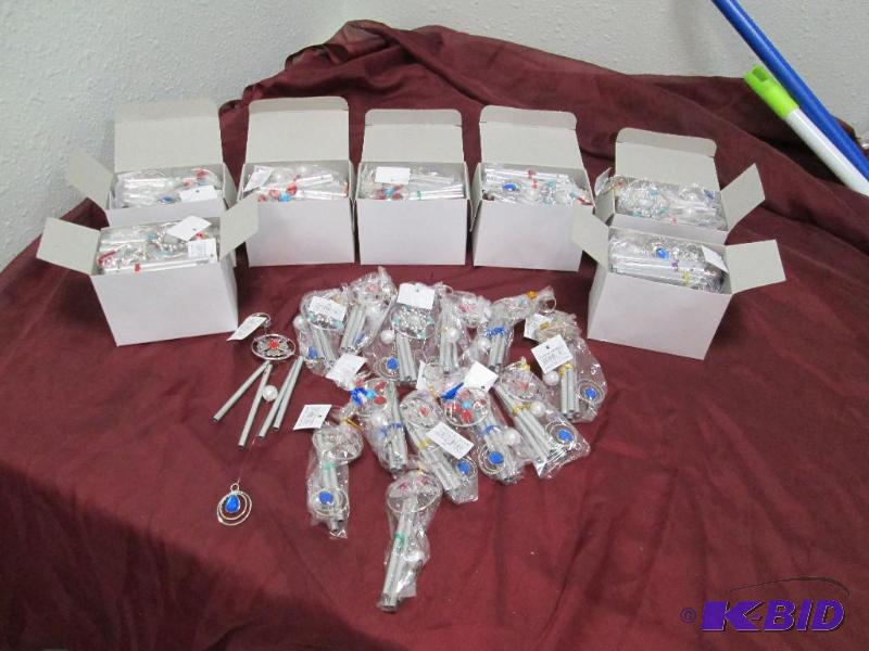 Qty 8 boxes of wind chimes, assortment of col...