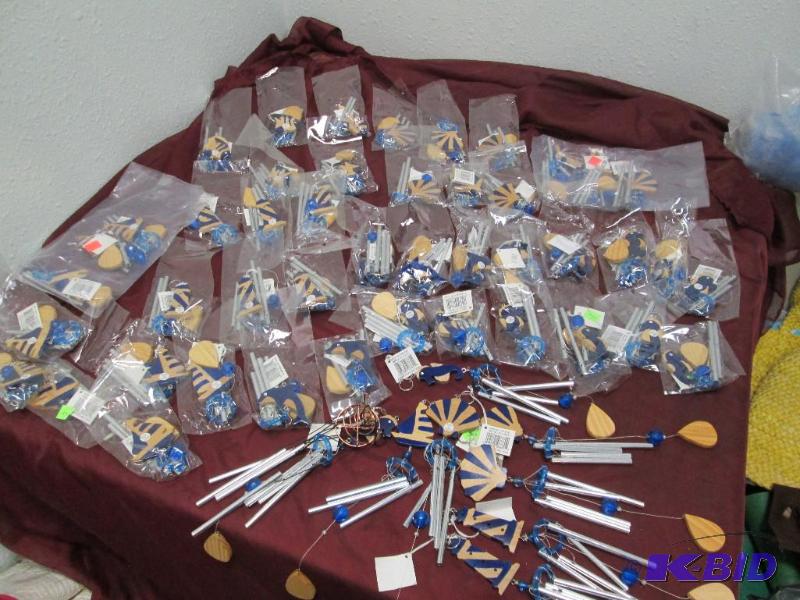 Qty 10 wind chimes shaped at a boat, 8 lighth...