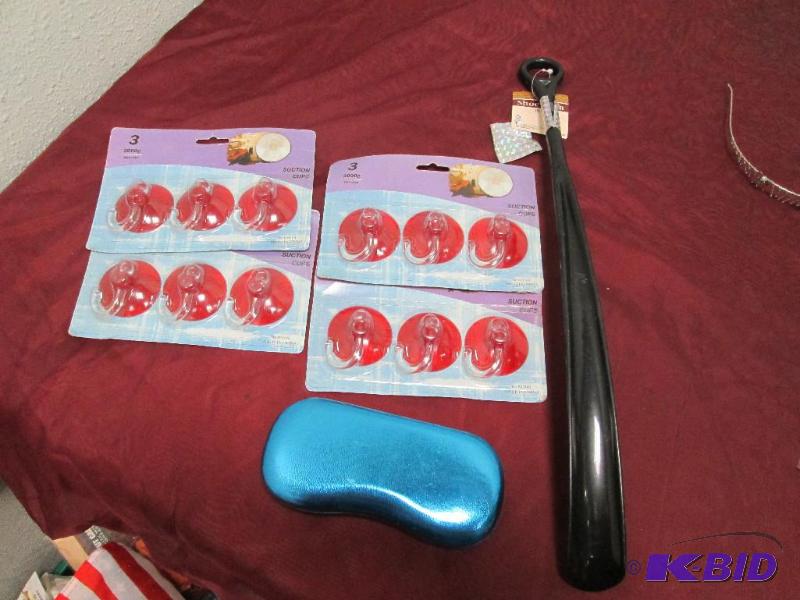 one blue eye case, one black shoe horn, and 4...