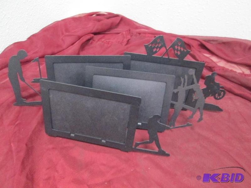 Qty 4 Black picture stand, one has a volleyba...