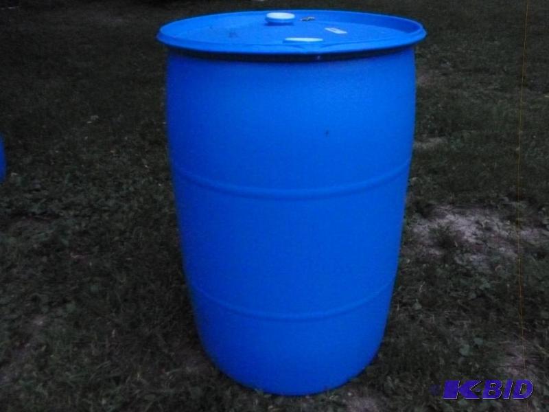 lot 17 image: Large 55 gallon plastic drum, comes with two ...