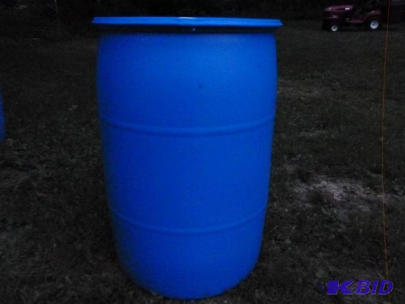 lot 21 image: Large 55 gallon plastic drum, comes with two ...