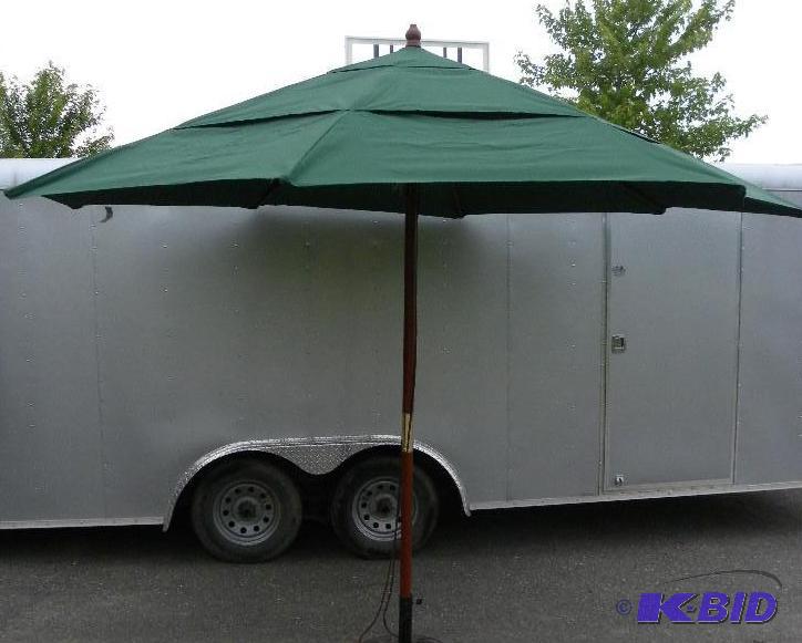 lot 60 image: 11 foot 3 Tier Umbrella, green, 3 section fab...