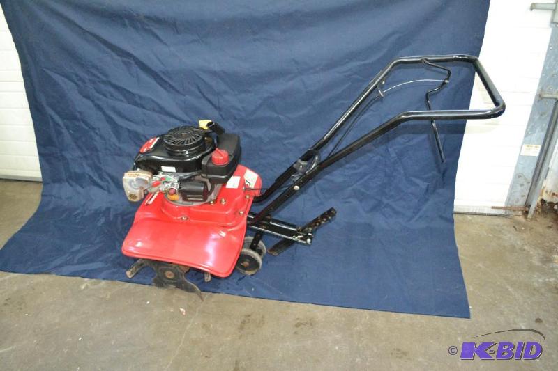 lot 5 image: YARD MACHINE TILLER WITH 5.5 HP RUNS AND WORK...