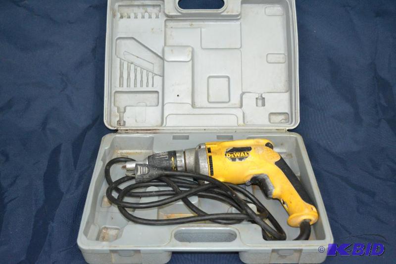 lot 6 image: DEWALT SHEETROCK DRILL IN CASE WORKS GOOD...