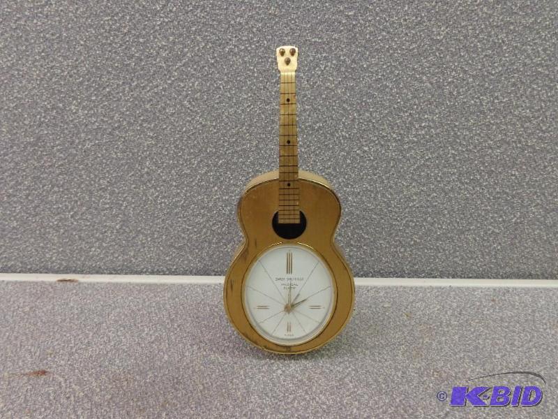 lot 120 image: Swiza Sheffield Musical Alarm Guitar Shaped&n...