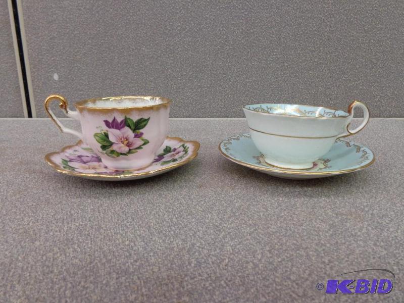 lot 145 image: Tea Cups and Saucers Light Blue Cup - Gold De...