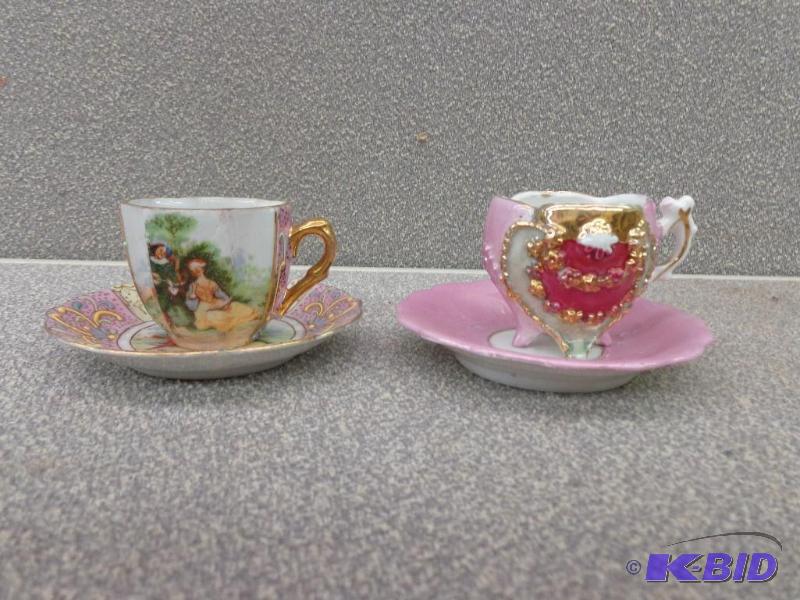 lot 53 image: (2) Miniature Tea Cups wPlates  (1) Pin...