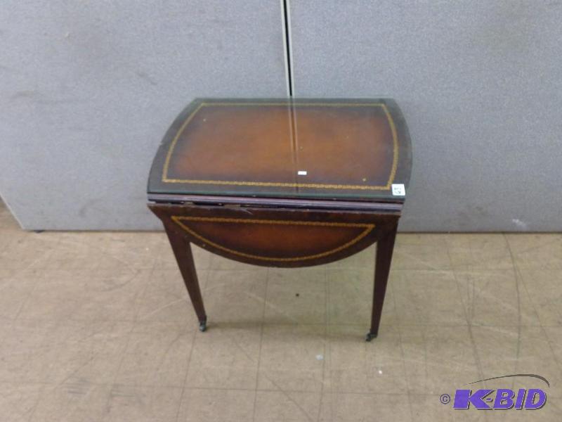 lot 63 image: Glass Top Table wFolding Sides Goes from 26&...