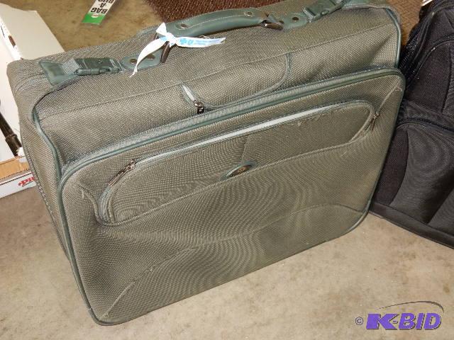 Swiss Gear and Samsonite Suit cases
