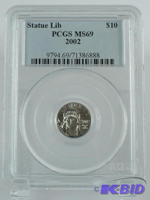 lot 19 image: 2002 $10 PLATINUM EAGLE STATUE OF LIBERTY 11...