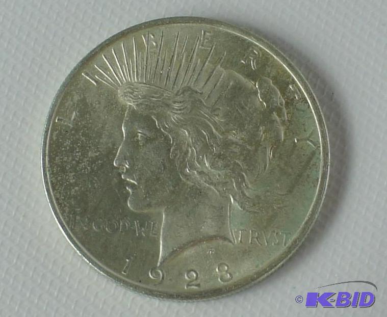 lot 26 image: 1923 Peace Liberty Silver Dollar. Nice Shape...