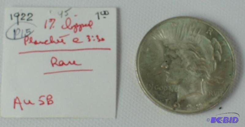 lot 27 image: 1922 Peace Liberty Silver Dollar. Rare Stampe...