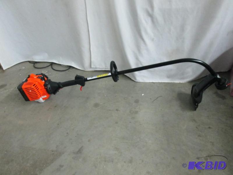 lot 11 image: Remington 17 Curved Shaft Gas Trimmer