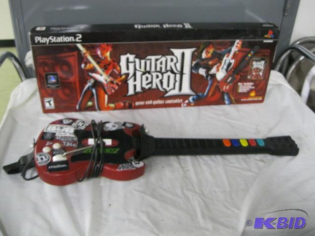 lot 34 image: 2 Guitar Heroes