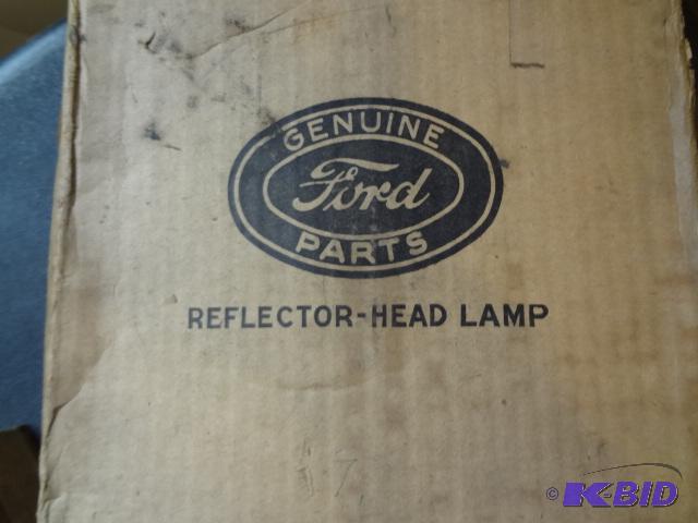 lot 107 image: Pair NOS 33-4 Headlight Reflectors...